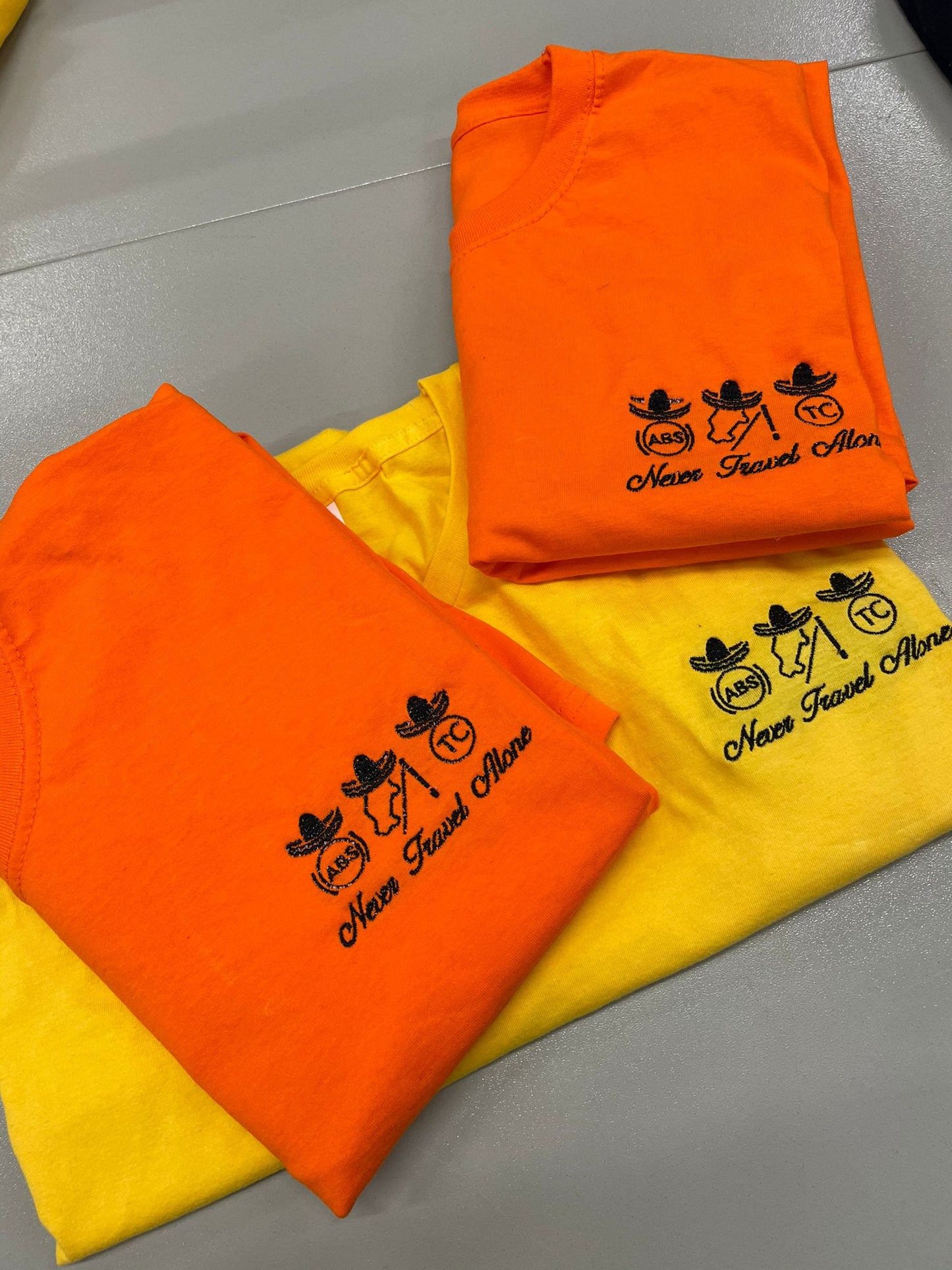 QM Never Travel Alone T-Shirts