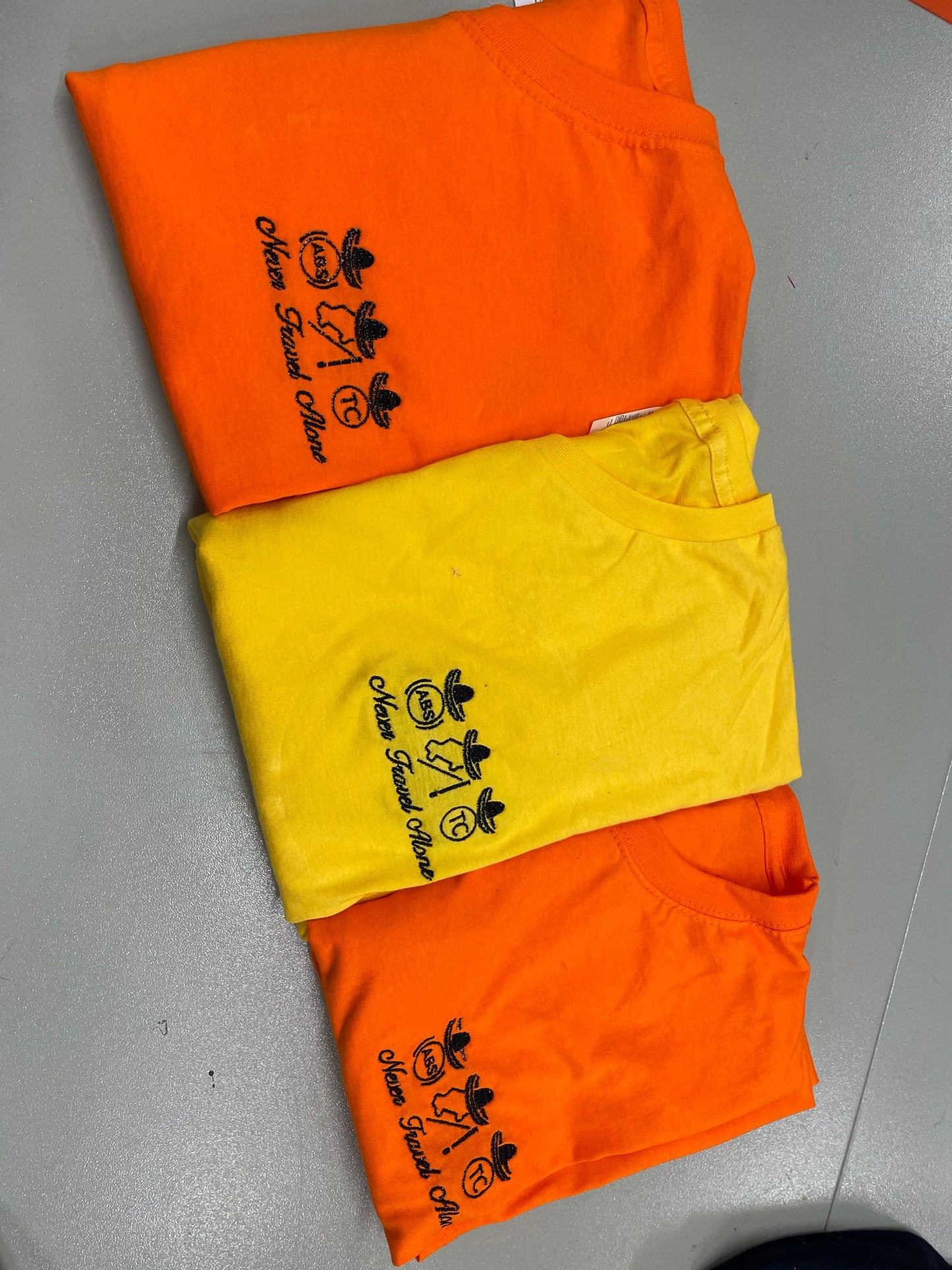 QM Never Travel Alone T-Shirts