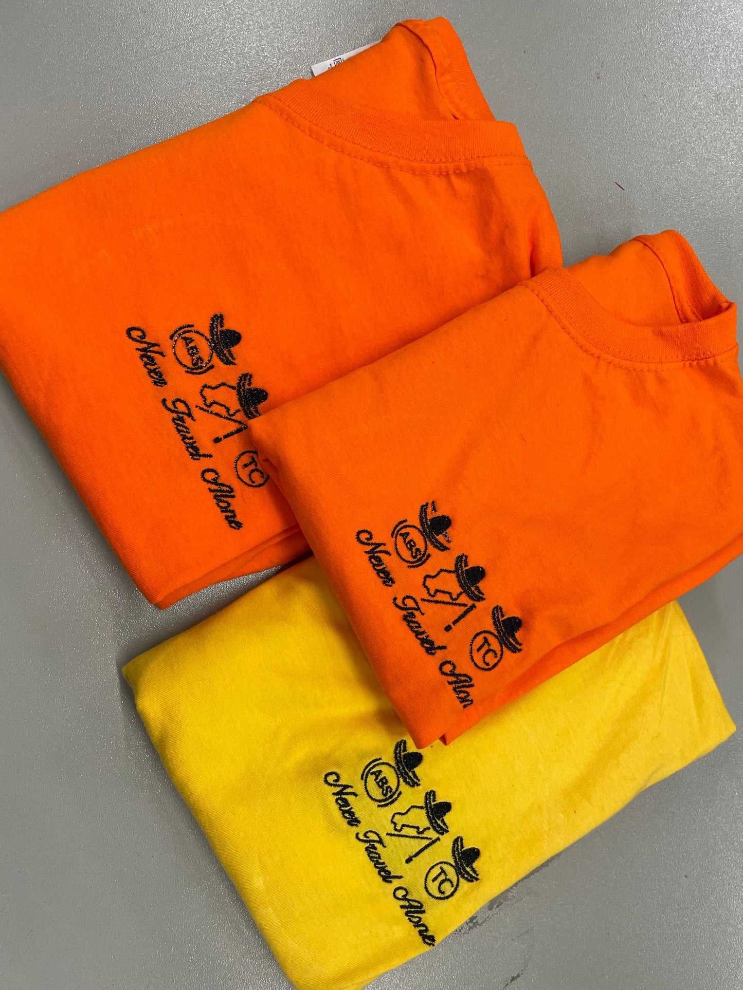 QM Never Travel Alone T-Shirts